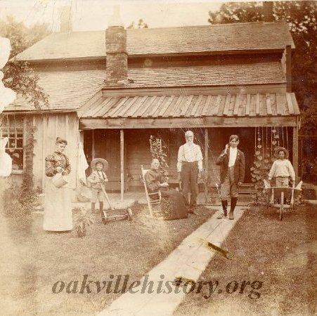 Rear of 145 William.  Johnsom family in the yard - 1910